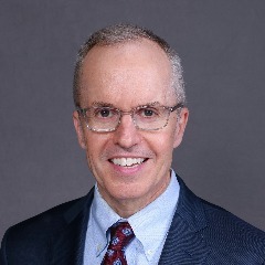 Professor Owen Arthurs, AI Conference Committee Chair